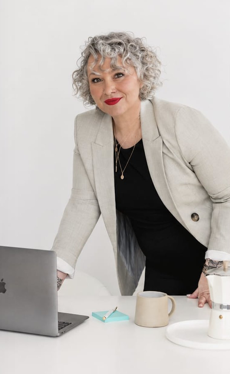 Nicole North, President and Founder of Whiteboard Learning, at her desk